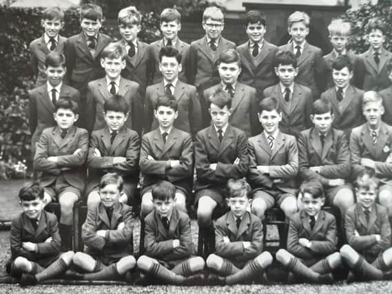 Boys sit smartly for their school photo
