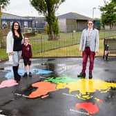 Samantha and Riley-Jay Hindmarch, Paul Galley and Michelle Backhouse with some of the artwork installed in East Pines Park