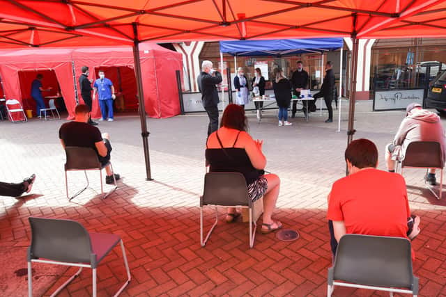 People waiting for their vaccine