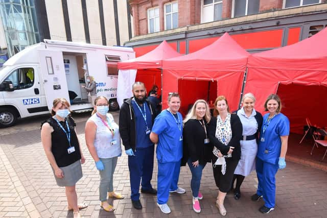 Staff from the Issa Medical Group helping with the vaccinations