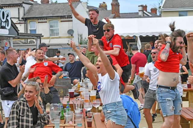 Fans celebrate at No 3 Bar earlier this month