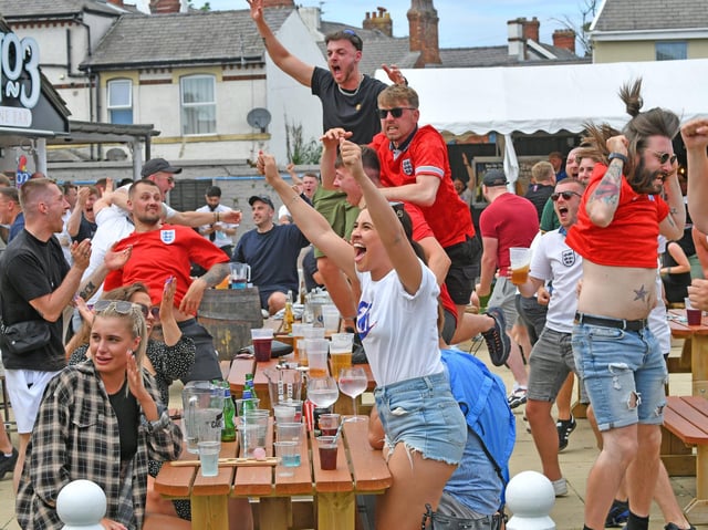 Fans celebrate at No 3 Bar earlier this month