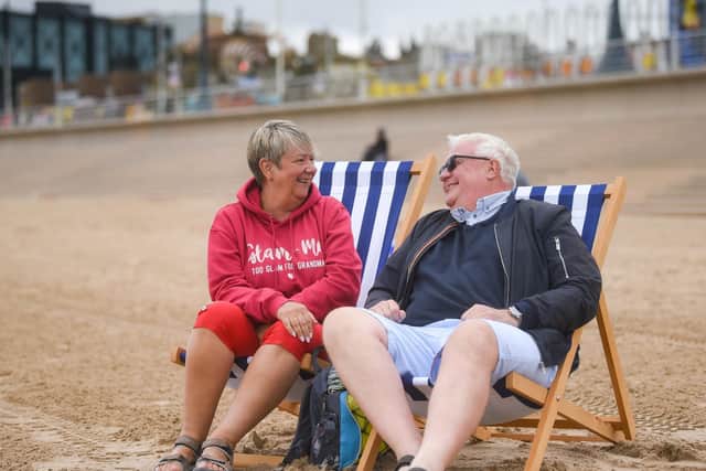 Teresa Everington and Graham Crump are the first ever customers to hire the new deck chairs.