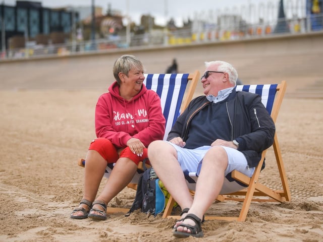 Teresa Everington and Graham Crump are the first ever customers to hire the new deck chairs.