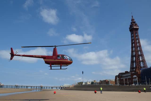Dan arrived by helicopter on Blackpool beach