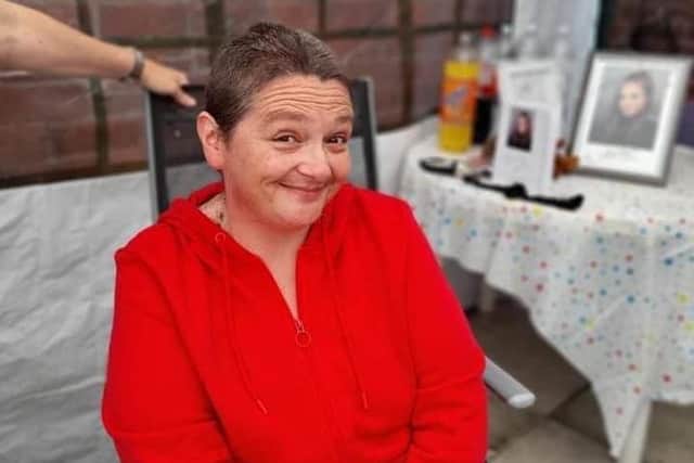 Linsey Smith from Layton shaved her head in a bid to raise enough money to buy a headstone for her goddaughter Lauren Bicket, who took her own life in May.