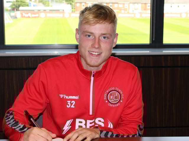 Paddy Lane signs his two-year Fleetwood contract