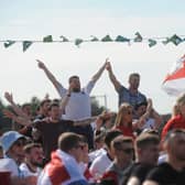 England fans celebrate at Pool Foot Farm in Thornton