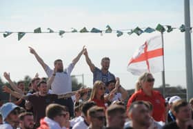 England fans celebrate at Pool Foot Farm in Thornton