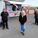 (L-R) William Hargreaves, Gillian Gallagher, Helen Crane outside Dolly's Kiosks who have organised raffles to raise money for a defibrillator at the newly reopened seafront toilet. Photo: Kelvin Stuttard