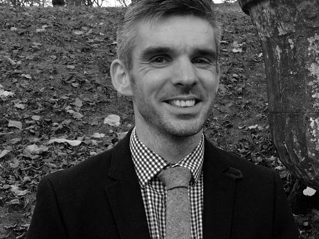 Leading book specialist Aaron Dean