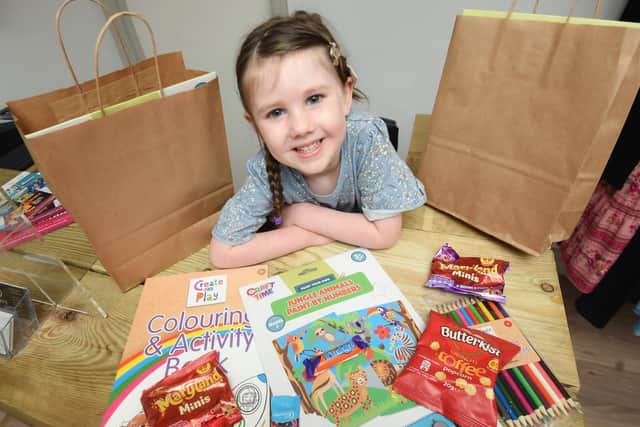 Ella Anderton, four, is raising money for Brian House Children's Hospice by selling goody bags for youngsters. Photo: Daniel Martino/JPI Media