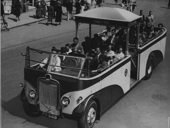 An example of an open-topped runabout bus which had a central canopy