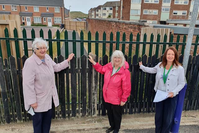 Fylde Council leader Coun Karen Buckley (right) with fellow ward councillors Coun Angela Jacques and Coun Delma Collins at the site of the intended access from the path into the station.