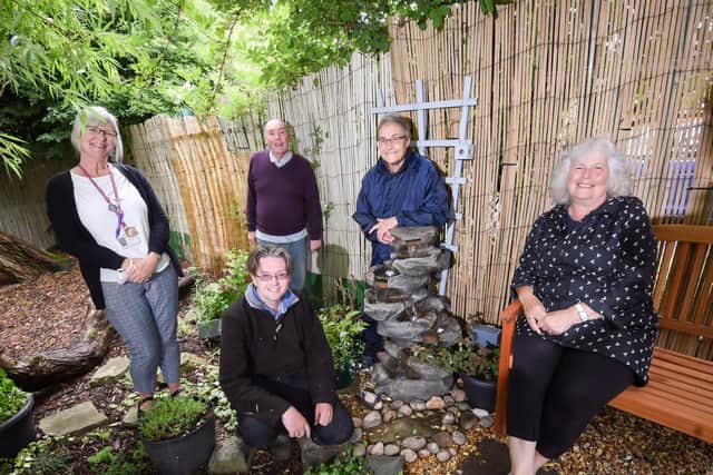 Library manager Jane Berry (left) and coun Paul Galley, with Eddie Backhouse, Irene Houghton and Lindsey Backhouse in Anchorsholme Library's garden. Picture: Daniel Martino/JPI Media