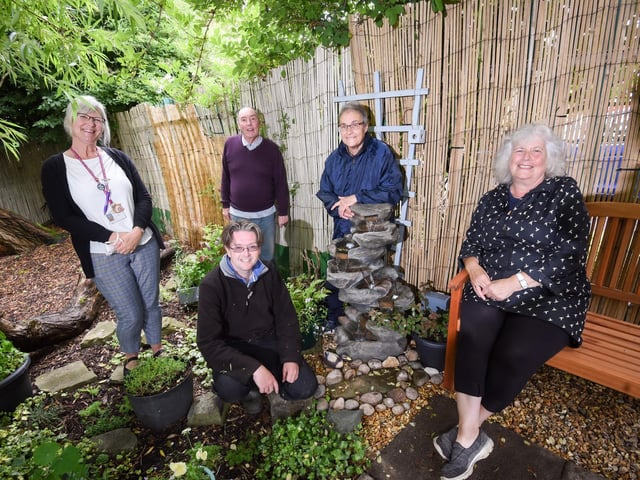 Library manager Jane Berry (left) and coun Paul Galley, with Eddie Backhouse, Irene Houghton and Lindsey Backhouse in Anchorsholme Library's garden. Picture: Daniel Martino/JPI Media