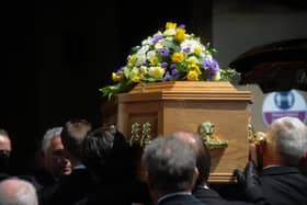 Brian London's coffin is taken into Carleton Crematorium