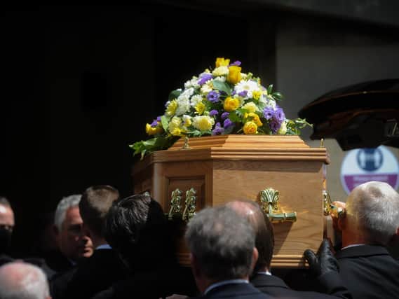 Brian London's coffin is taken into Carleton Crematorium