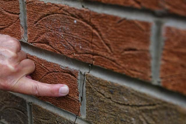 Close up of the crack which has appeared in Jane's wall.