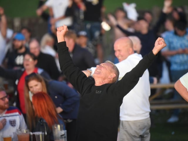 Fans in Blackpool celebrate victory over the Danes in Wembley