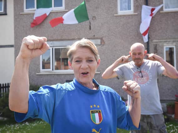Marianna Mitchell supports Italy while husband Steve Mitchell supports England