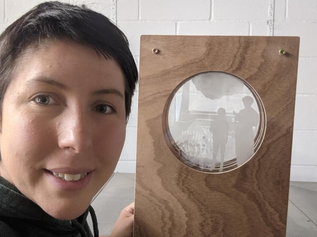 Artist Alex Blakey working on one of the Peep Hole Boxes as part of the Kirkham Treasures art installations