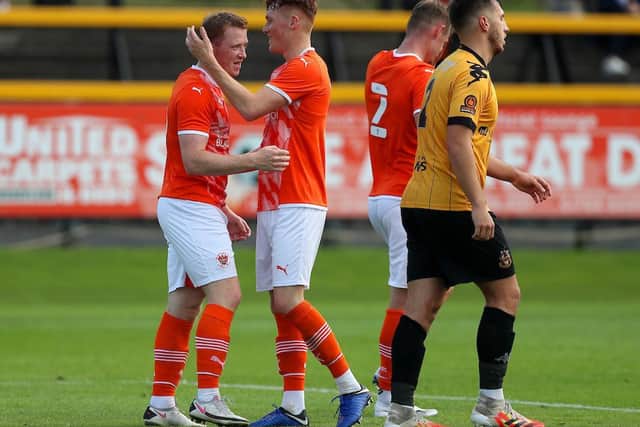 Shayne Lavery, left, scored on his Blackpool debut