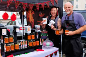 Pete and Emma Yates from Bertie Chippington's Hot Sauce on their stall at the market