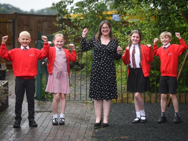 Headteacher Rhiannon Jones with Kirkham and Wesham pupils Ruslans Stefanovics, Tia Clements, Elsie Sweatman and Jacob Tidswell.
