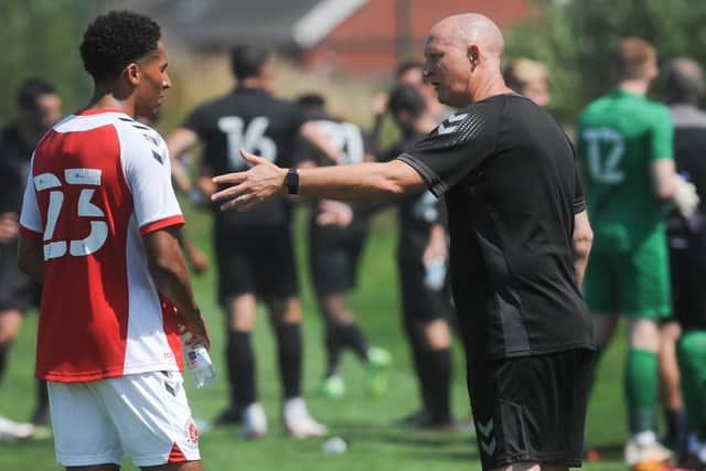 Simon Grayson gives instructions to James Hill during the Poolfoot Farm friendly with Port Vale