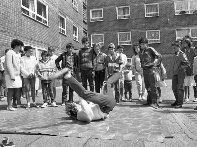 An afternoon of fun and music could mark the turning point for the residents of a strife-torn flats complex. Their summer festival may not have been as lavish or big as many Lancashire carnivals but in many ways it was more important. For the people who live in three high-rise blocks on Moor Lane, Preston, it was an important step towards creating community spirit in a place where it has been sadly lacking. Pictured: A group of lads calling themselves 'Level One' gave demonstrations of breakdancing