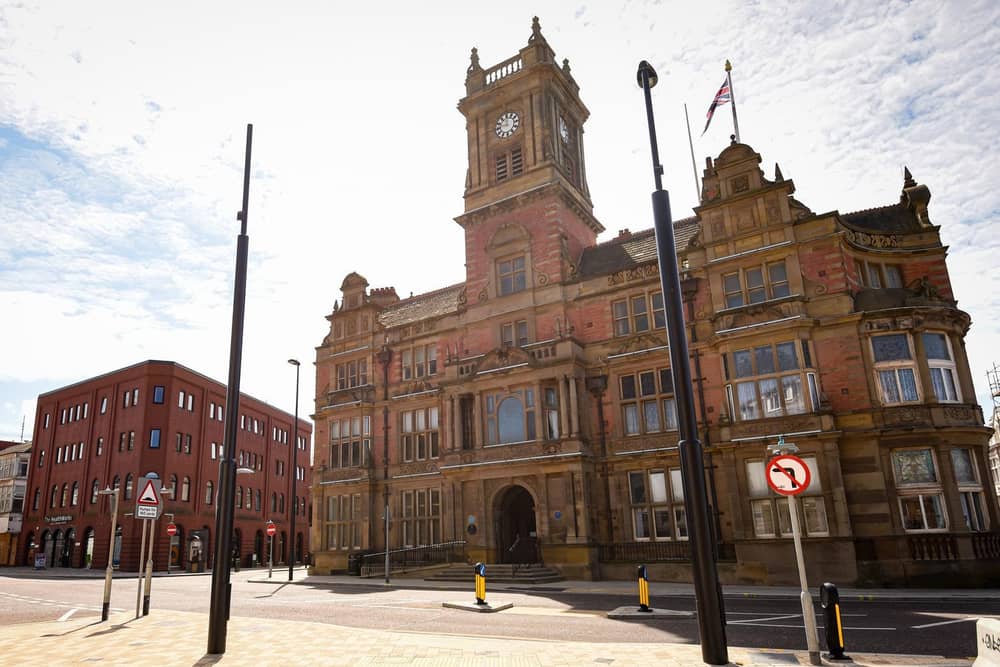 Town hall leaders have called for tough action against online racists