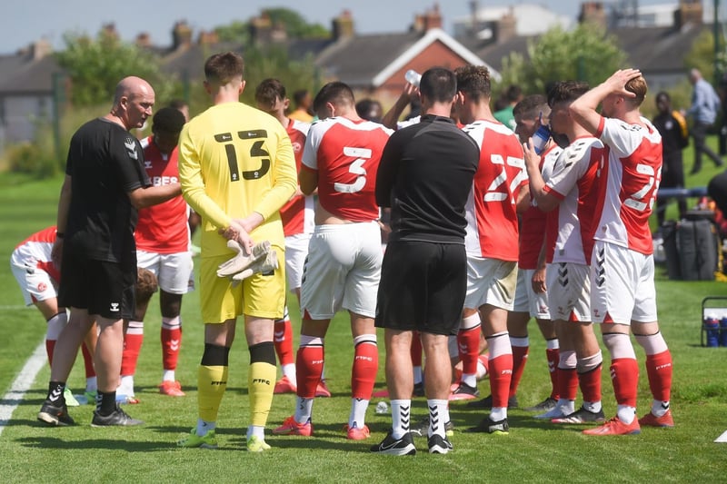 Simon Grayson has a word with his first half XI at the end of the first quarter.