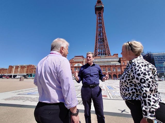 Keir Starmer talks to council officials on the Comedy Carpet