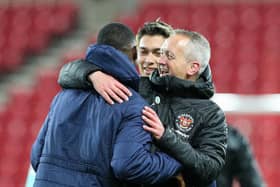 Neil Critchley with Sullay Kaika after the win at Sunderland in April which turned out to be the forward's final game for Blackpool