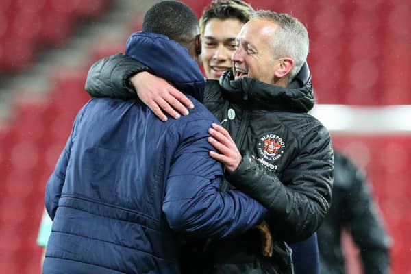 Neil Critchley with Sullay Kaika after the win at Sunderland in April which turned out to be the forward's final game for Blackpool