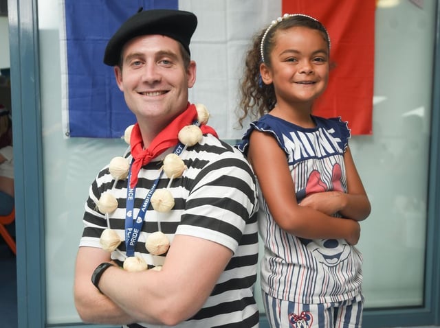 Year five teacher and languages lead David Snelling with Malaya Anson. Pic: Daniel Martino/JPI Media