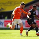 Ollie Turton's last game for Blackpool was the play-off final win against Lincoln City