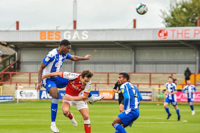 Emeka Obi in action for tonight's opponents Wigan last season at Fleetwood Town
