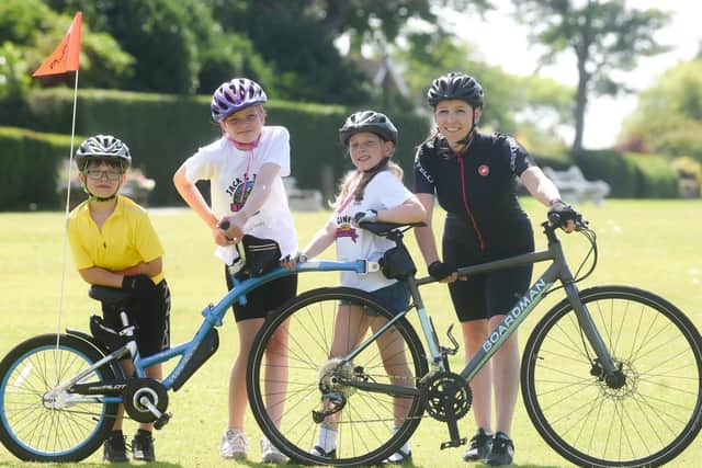 Julie Williams and children (from left): Jack, Tilly and Ginny get set for the charity bike ride