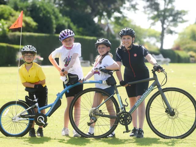Julie Williams and children (from left): Jack, Tilly and Ginny get set for the charity bike ride