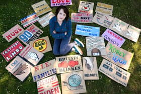 Leigh Barton with some of the placards she has made during the 90-day protest