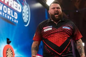 Michael Smith won an epic battle in his bid to go one better than 2019 in Blackpool