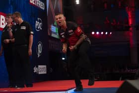 Nathan Aspinall faces Michael van Gerwen after beating Gary Anderson on Wednesday Picture: Lawrence Lustig/PDC