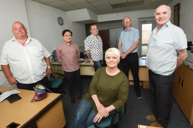 Ron Heywood (far right) with members of the team at the Fylde Coast Advice and Legal Centre