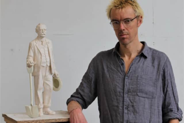 Sculptor Ben Twiston-Davies with the maquette for his statue of Ebenezer Howard, the founder of the Garden City movement, now installed in the centre of Welwyn Garden City