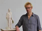 Sculptor Ben Twiston-Davies with the maquette for his statue of Ebenezer Howard, the founder of the Garden City movement, now installed in the centre of Welwyn Garden City