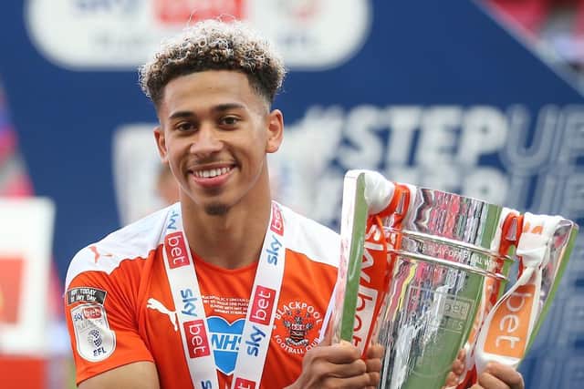 Gabriel celebrates Blackpool's promotion at Wembley in May