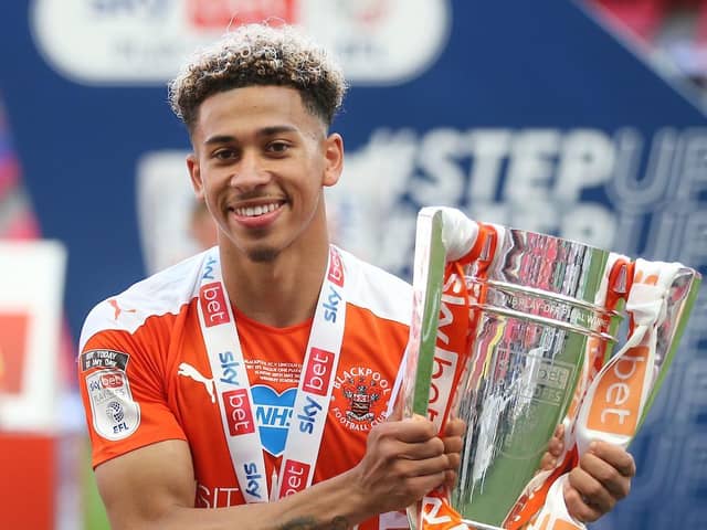 Gabriel celebrates Blackpool's promotion at Wembley in May