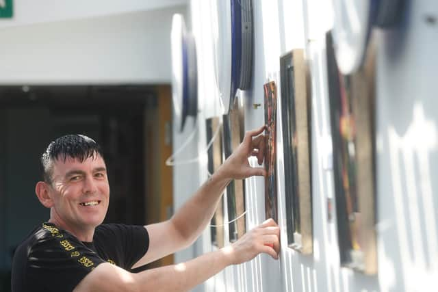 Artist Robert Haworth with his new exhibition at the Solaris Centre.